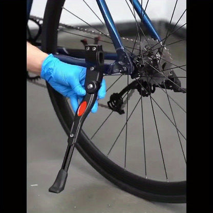 Cavalletto bici regolabile con bici in posizione parcheggiata