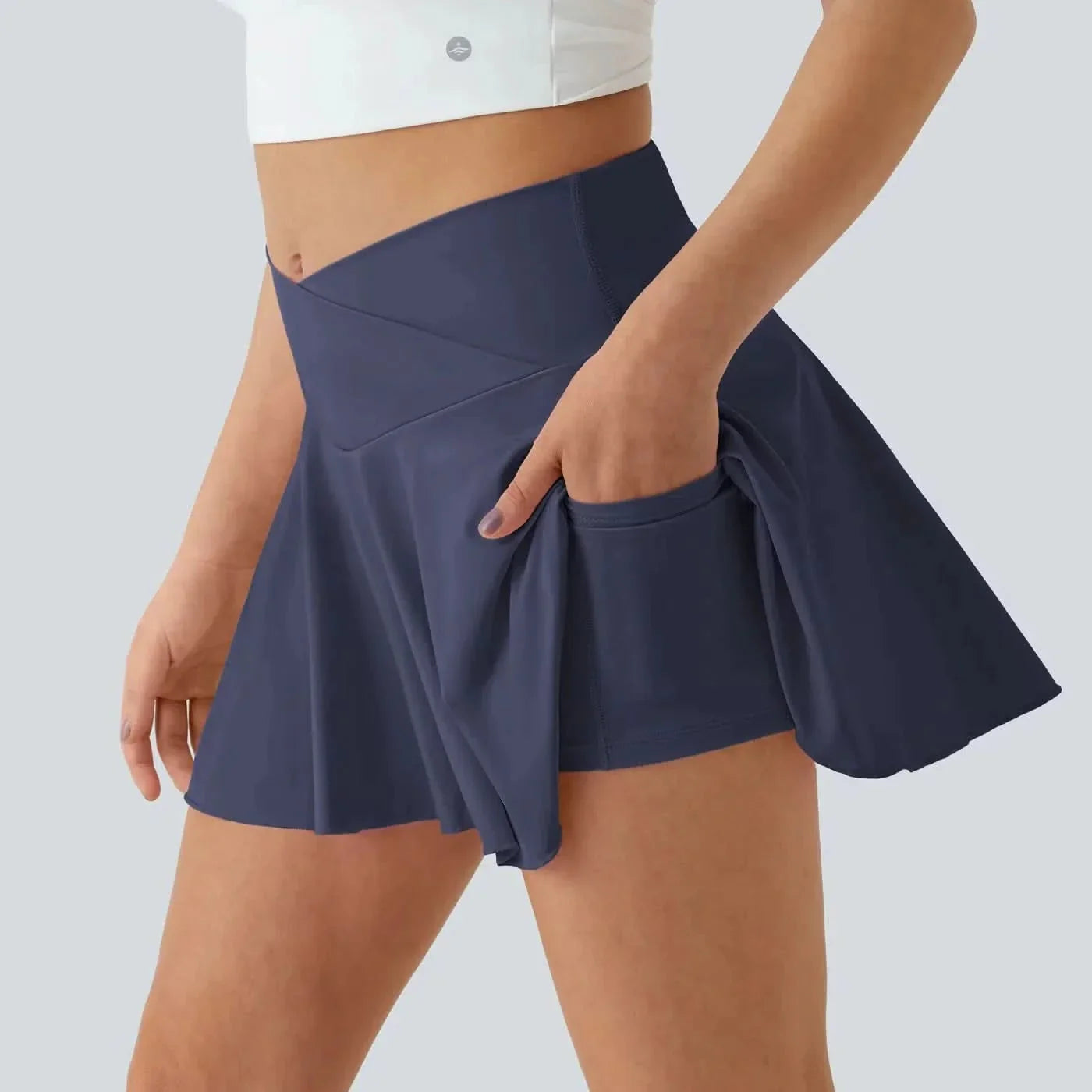 SOFTLYZERO - Gonna da tennis leggera con pantaloncini integrati e protezione UPF50+