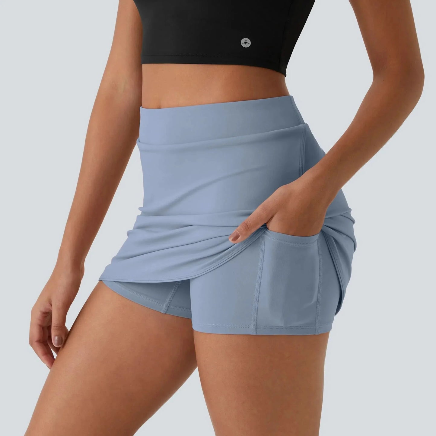 CLARITY - gonna da golf micro 2-in-1 con tasche nascoste e cintura in vita alta e piatta