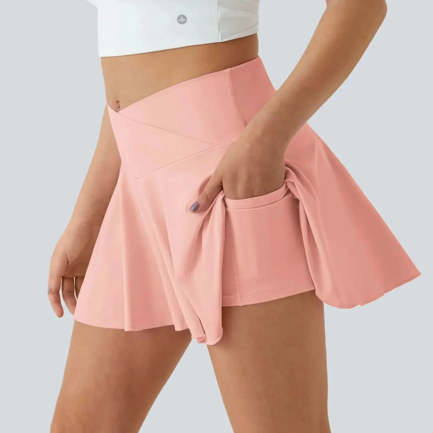 SOFTLYZERO - Gonna da tennis leggera con pantaloncini integrati e protezione UPF50+