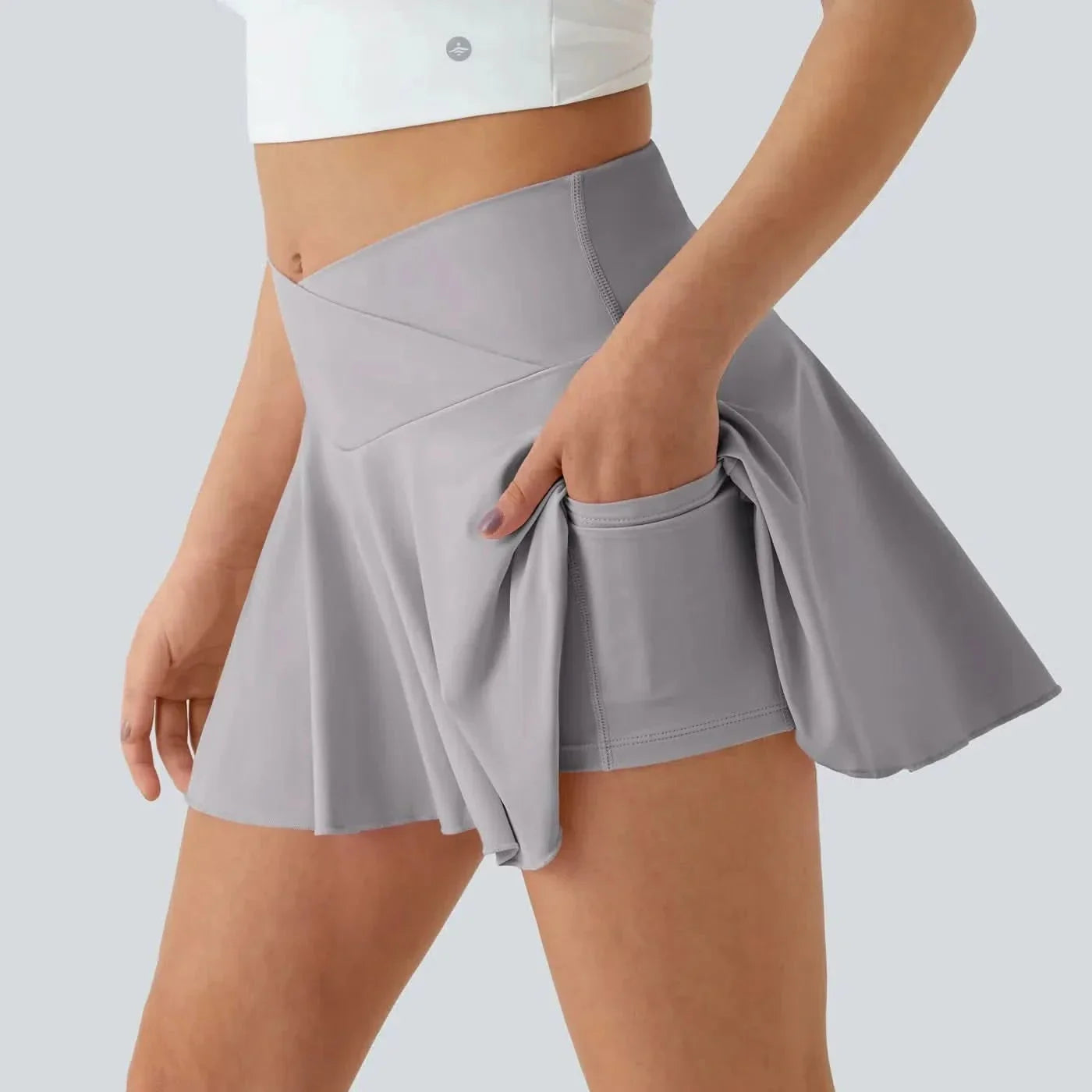 SOFTLYZERO - Gonna da tennis leggera con pantaloncini integrati e protezione UPF50+