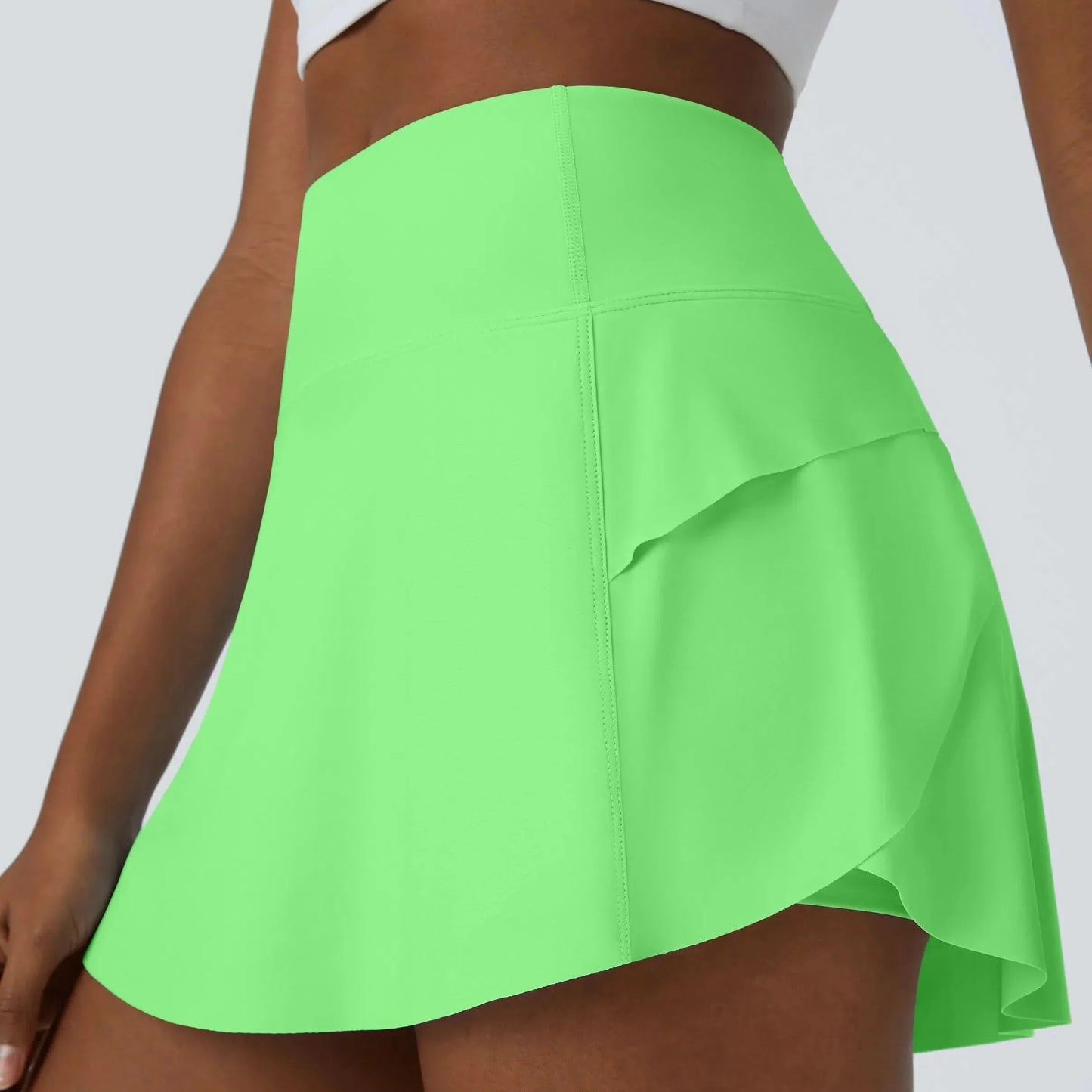 DANCEFLOW - Gonna da danza 2-in-1 con pantaloncini integrati e tasca posteriore nascosta