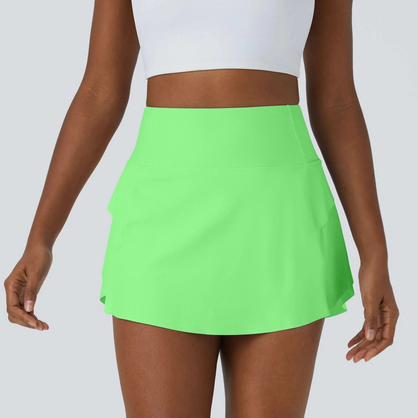 DANCEFLOW - Gonna da danza 2-in-1 con pantaloncini integrati e tasca posteriore nascosta