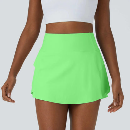 DANCEFLOW - Gonna da danza 2-in-1 con pantaloncini integrati e tasca posteriore nascosta