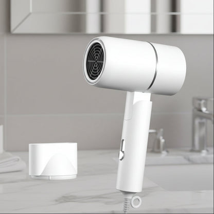 TRAVELBLOW - Asciugacapelli pieghevole con tecnologia agli ioni per capelli lucidi