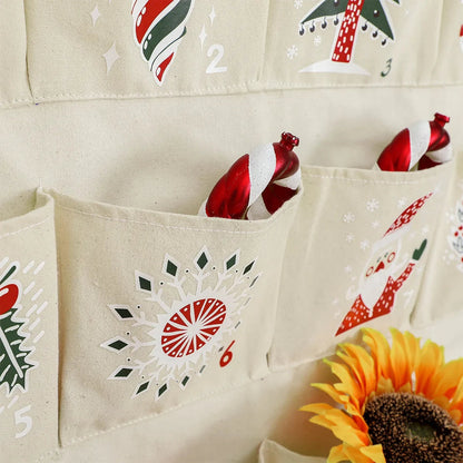 FestiveCanvas | Calendario dell'Avvento colorato da appendere con 24 tasche portaoggetti