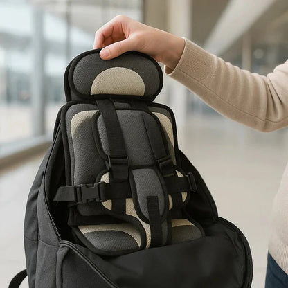 Seggiolino per bambini pieghevole da viaggio con sistema di cinture GoSeat