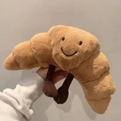 Cuscino Peluche a Forma di Croissant 33 cm – Morbido, Marrone Chiaro, con Sorriso