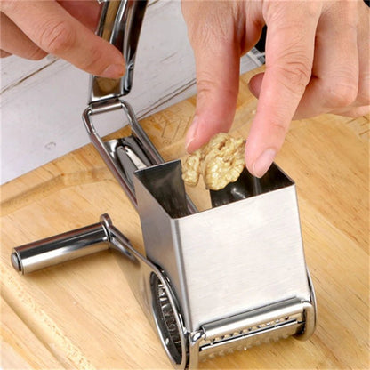 GRATE MOTION – Grattugia rotante in acciaio inossidabile per una preparazione in cucina senza sforzo
