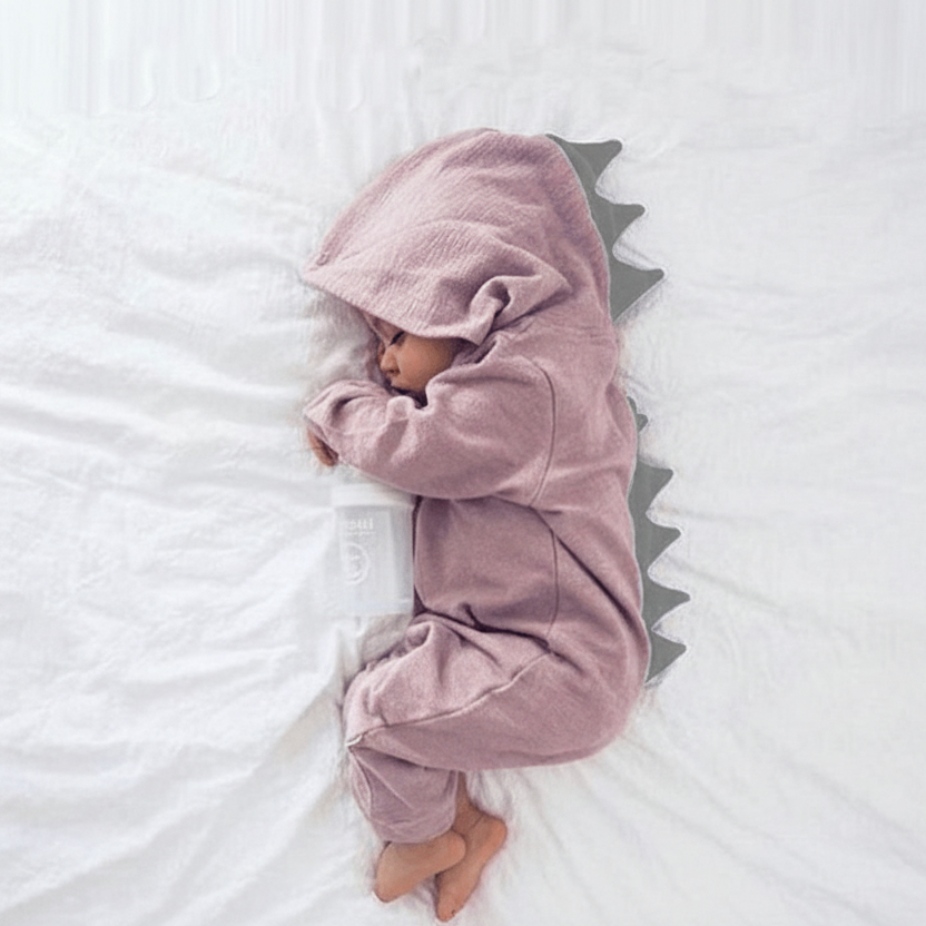 DinoCuddle - Il morbido romper a tema dinosauro per neonati e bambini piccoli