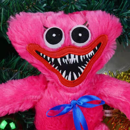 Dettaglio del viso del Giocattolo di Peluche Huggy Wuggy