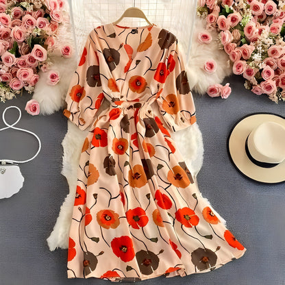 Vestito estivo in chiffon floreale con scollo a V che slancia e maniche a sbuffo