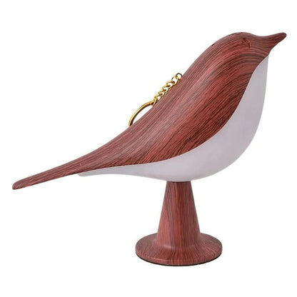 Lampada da tavolo a forma di uccello con design che cambia colore