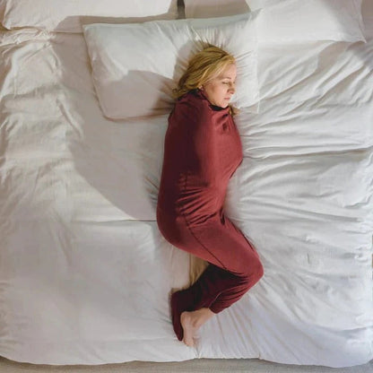 Body unisex indossabile con coperta avvolgente e drappeggio aperto