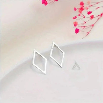 Orecchini pendenti geometrici a forma di diamante e freccia in oro e argento
