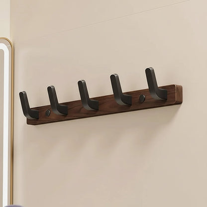 Gancio appendiabiti da parete con design in legno e metallo