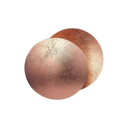 Applique da parete moderna Lunaris — struttura a dischi sovrapposti ispirata all'eclissi solare