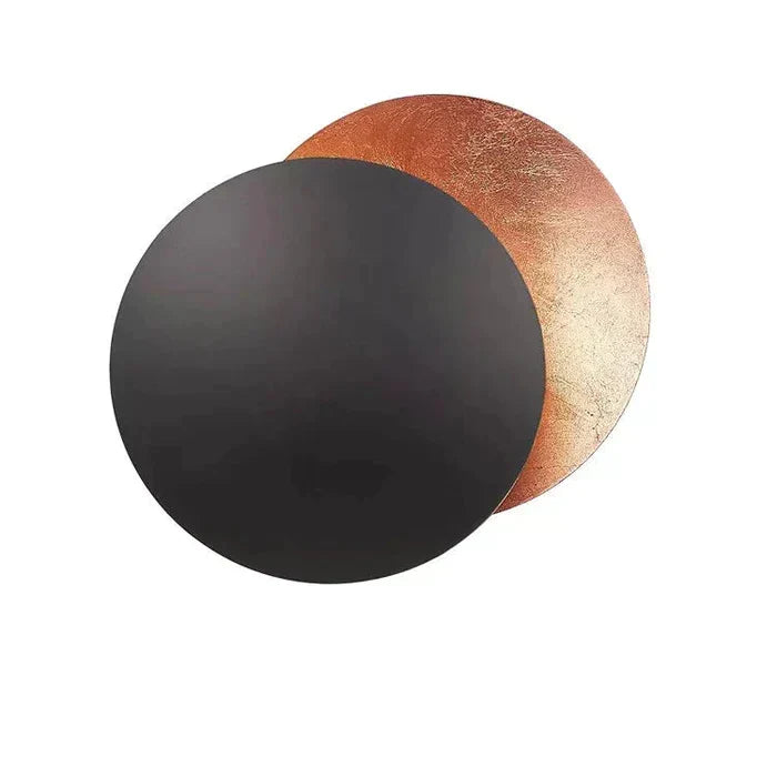 Applique da parete moderna Lunaris — struttura a dischi sovrapposti ispirata all'eclissi solare