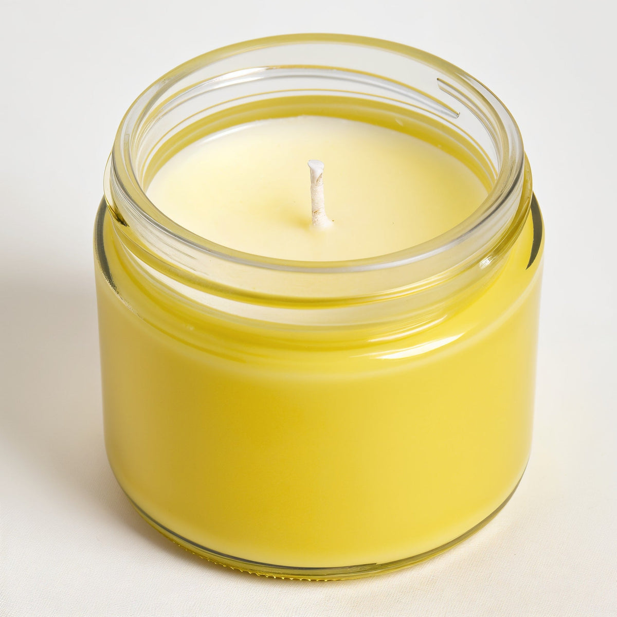 Rassivo Lemongrass Soy Candle — barattolo giallo brillante dal design minimalista