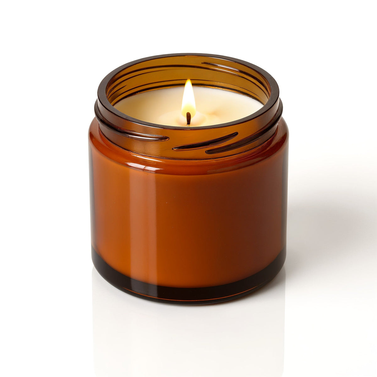 Candela di soia Amber Nights Rassivo in vasetto di vetro ambrato