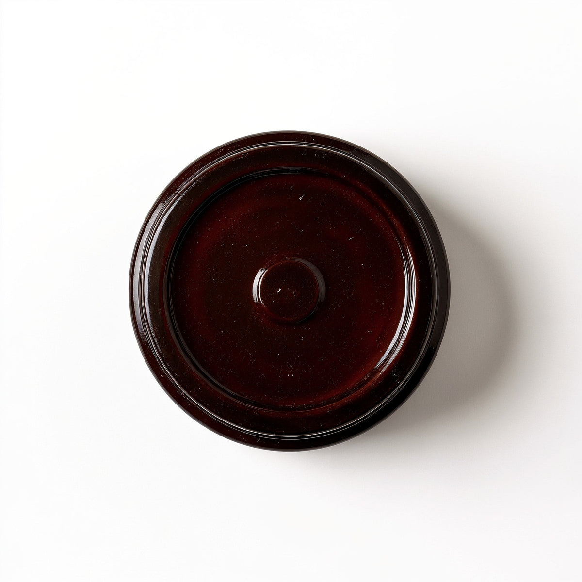 Candela di soia Cedarwood Musk — barattolo marrone scuro con texture in rilievo