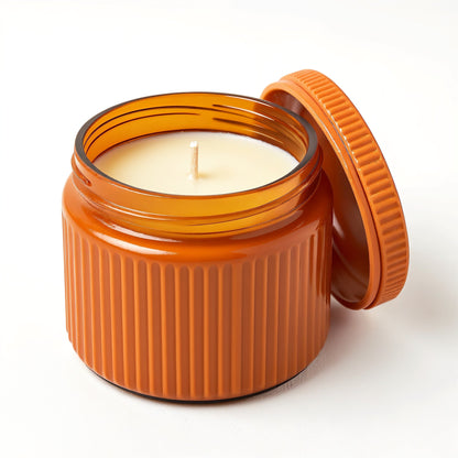 Candela di soia Ginger Spice — Vaso arancione con texture a coste