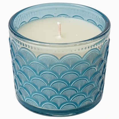 Candela di soia Ocean Mist in vasetto di vetro blu con motivo a onde