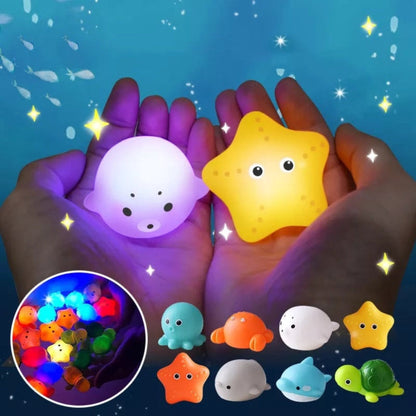 Giocattoli da bagno galleggianti interattivi luminosi