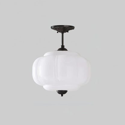 Plafoniera vintage in vetro con dettagli in ottone, elegante lampada a soffitto