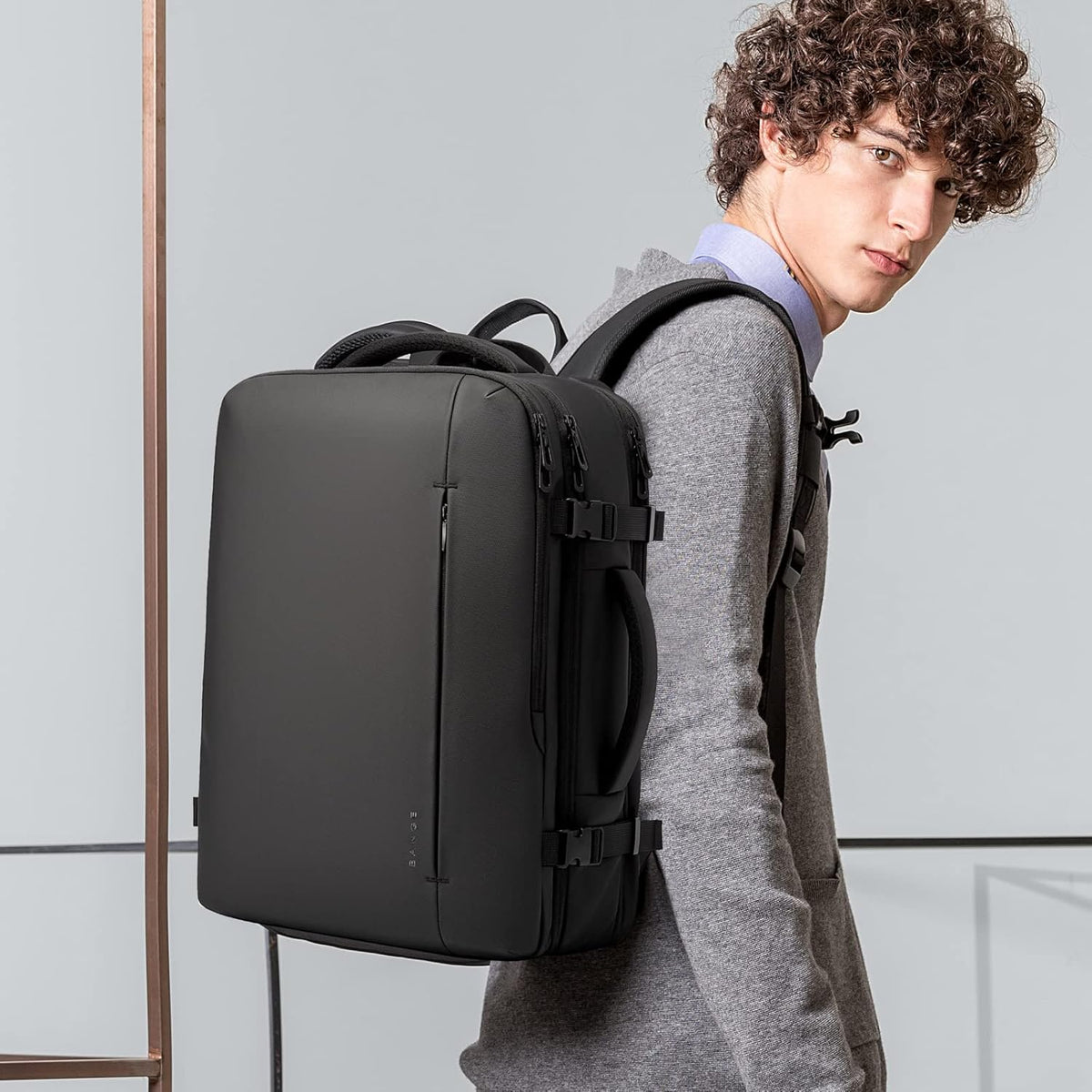 Zaino da viaggio espandibile 26–45 L impermeabile con tasca laptop e maniglie duffle