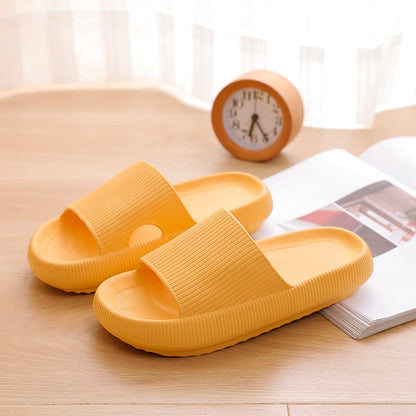 Chaussons Happy Flops su pavimento bagnato